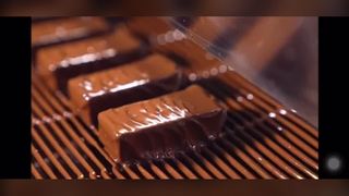 Machine de revêtement de chocolat d'échelle de chaîne de grillage plat d'enrobeur de forme de Z d'acier inoxydable 316 enrobant O