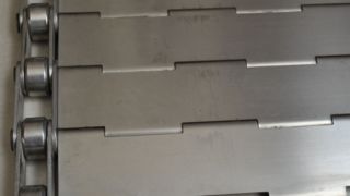 Bande transporteuse de copeaux de plaque métallique de lien de chaîne de lamelle d'acier inoxydable en métal pour la boulangerie de four à biscuits Anneali